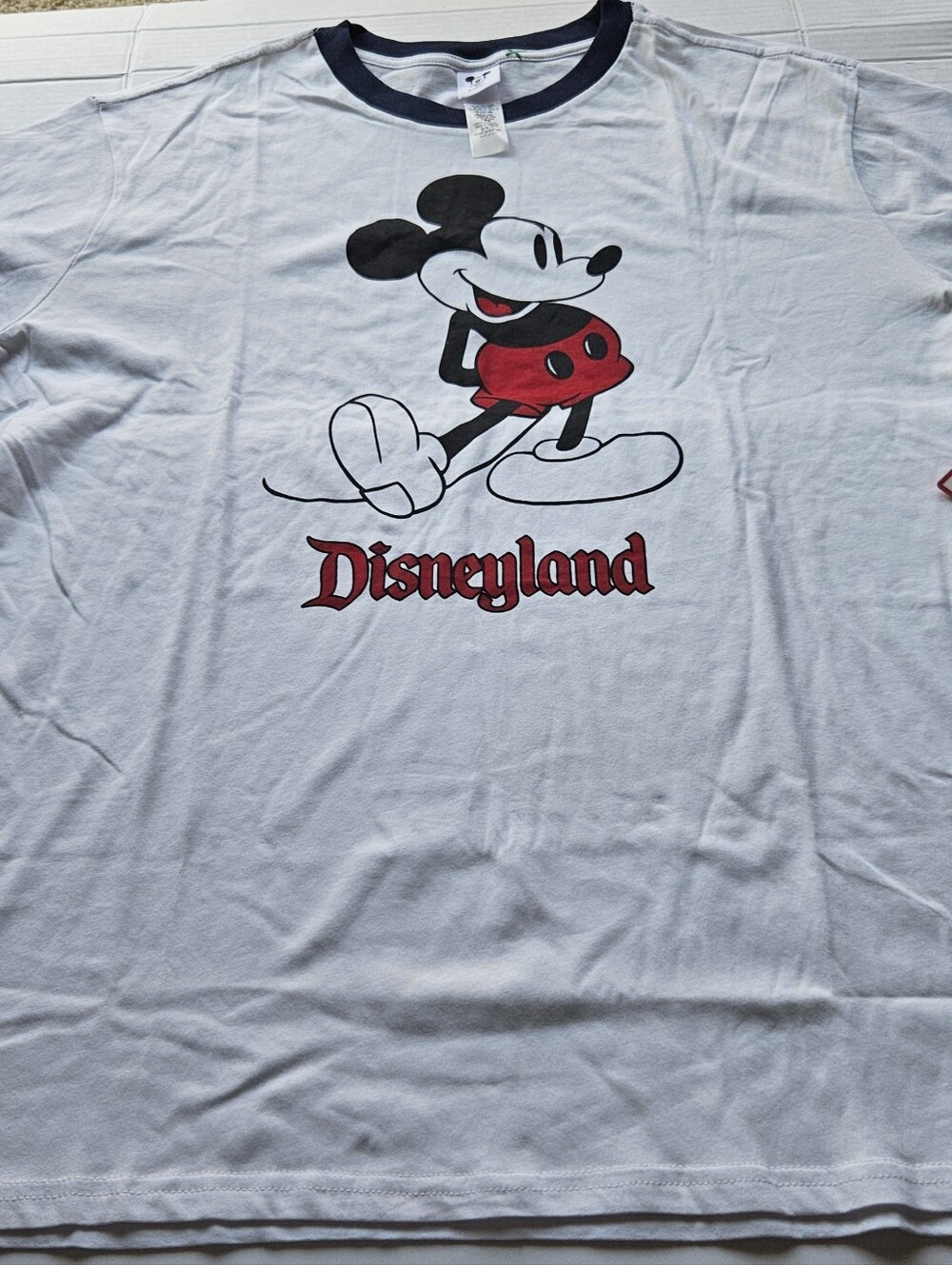 Disneyland Mickey Mouse ringer t-shirt features a vintage-style graphic of Micke